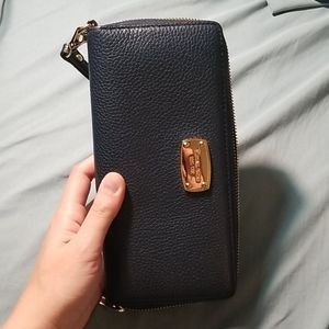 PRICE FIRM ! MK navy blue wallet with strap